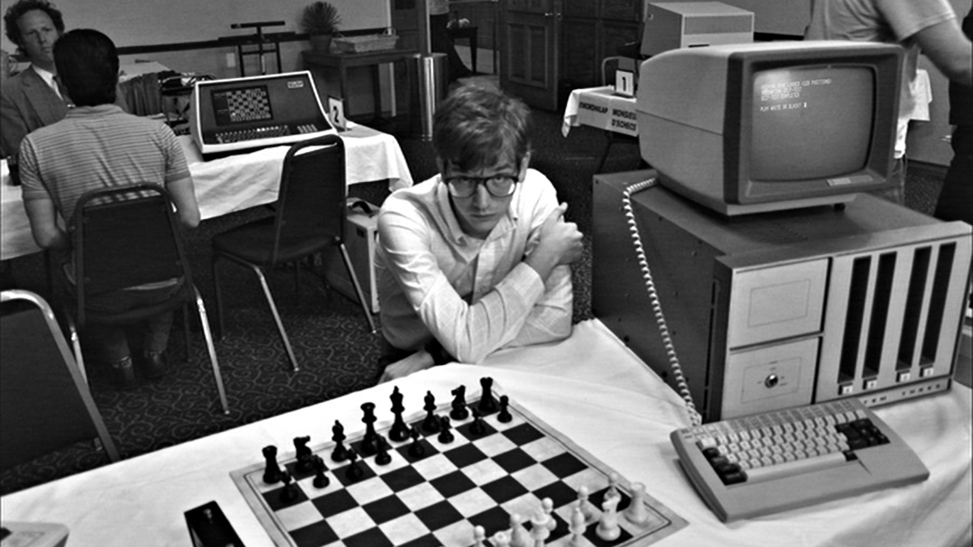 Caucasian man playing chess computer hi-res stock photography and